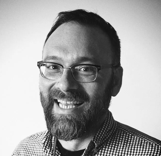 Small headshot photo of David Eads.